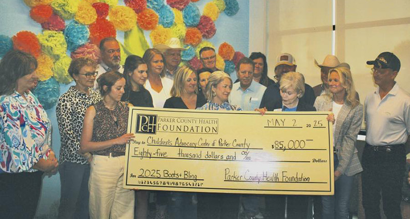 Children&apos;s Advocacy Center with check from PCHF