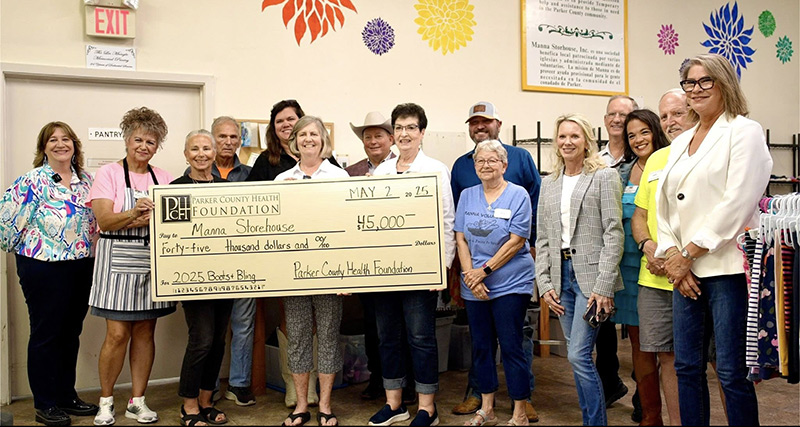 Manna Storehouse with check from PCHF